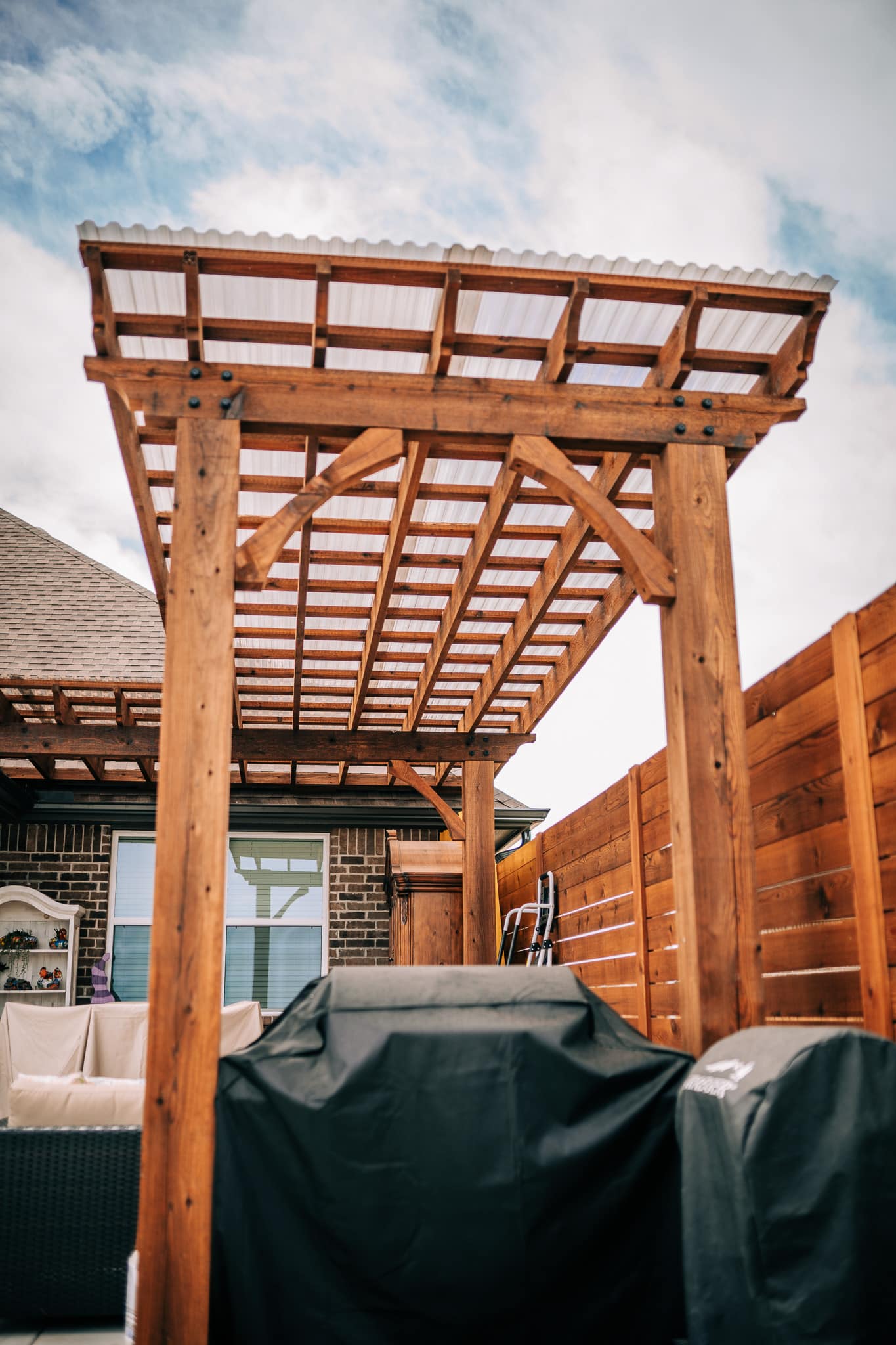 Landscaping in OKC, a wooden pergola